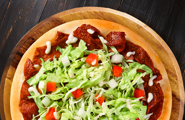 Classic Donair with donair meat, lettuce, onions, tomatoes and donair sauce