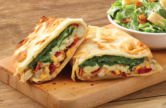 Chipotle chicken and bacon naanwich with spinach, Parmesan and mozzarella
