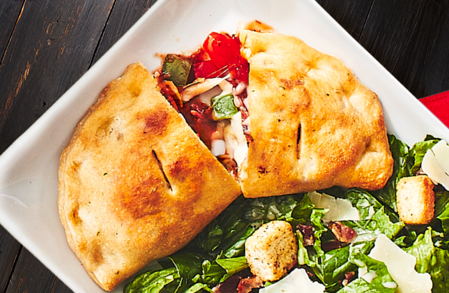 Classic panzerotti stuffed with pizza sauce, mozzarella and three toppings