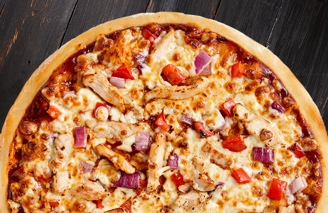 BBQ chicken pizza with grilled chicken, red peppers, red onions and mozzarella