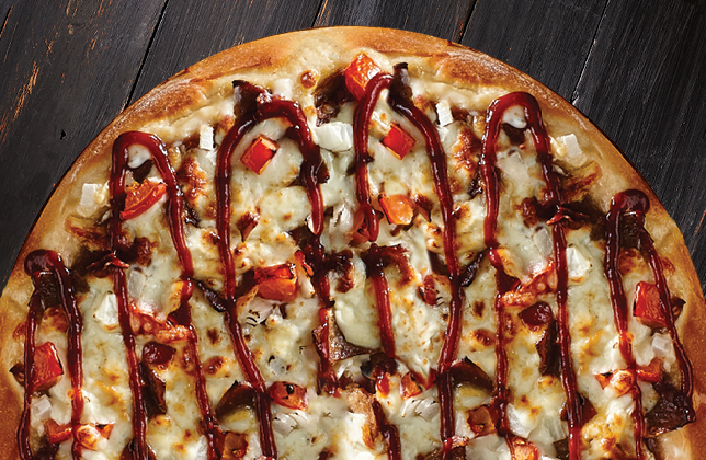 Smoky bacon donair pizza with donair meat, bacon, onions, tomatoes, mozzarella and BBQ sauce