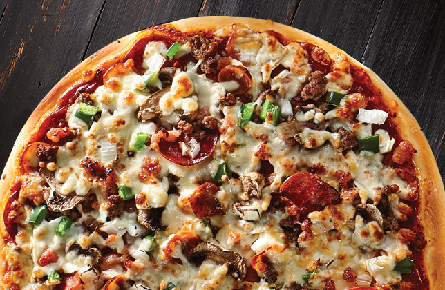 Works pizza with pepperoni, salami, bacon, ground beef, vegetables and mozzarella