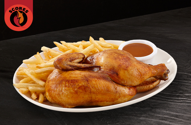 Half rotisserie chicken seasoned with Scores spices