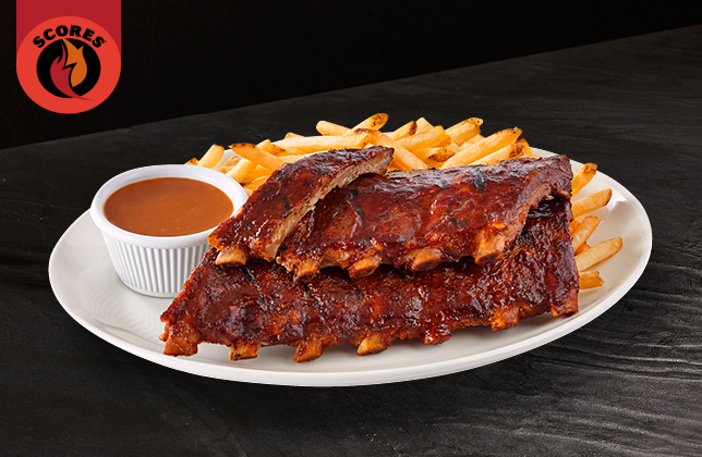 Slow-cooked pork back ribs glazed with smoky sweet BBQ sauce