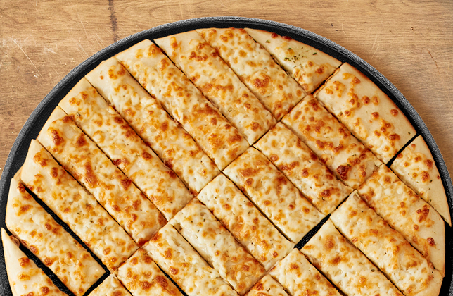 Garlic cheese fingers topped with melted mozzarella